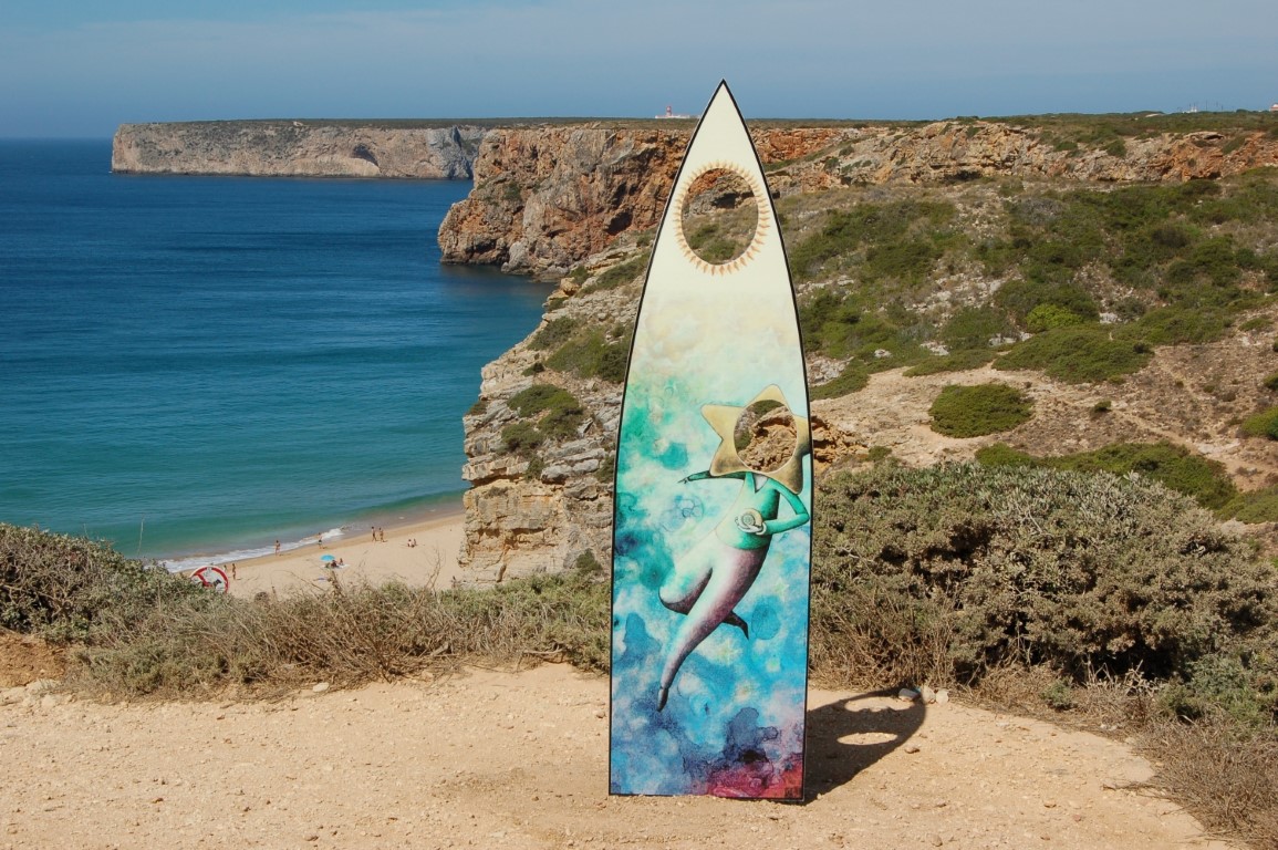 Sul Informação - E que tal uma fotografia na praia com uma prancha de surf?