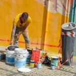 Sul Informação - Mural «amarelão» interpela transeuntes frente à Câmara de Portimão