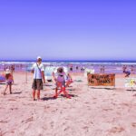 Sul Informação - Manif anti petróleo aproveita vinda de McNamara à Praia do Amado
