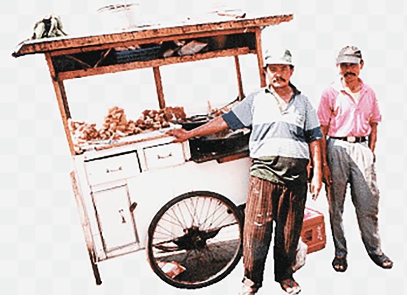 Imagem antiga do Homem das castanhas em Faro