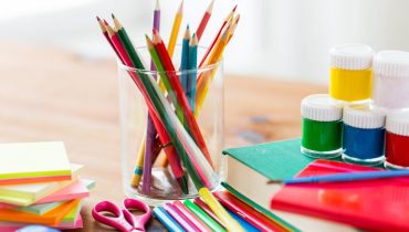 close up of stationery or school supplies on table