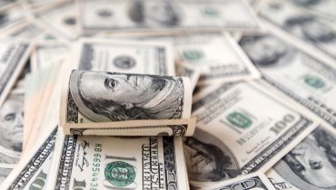 Close Up of Stack of dollars as background