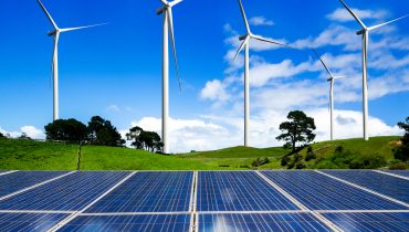 Solar panel and wind turbine farm clean energy.