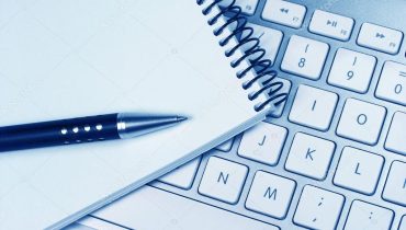 Jornalismo_escrita_depositphotos_32449749-stock-photo-computer-keyboard-idea-notepad