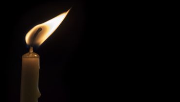 a burning candle on a dark background.|SONY DSC