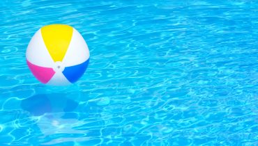 Inflatable ball in swimming pool