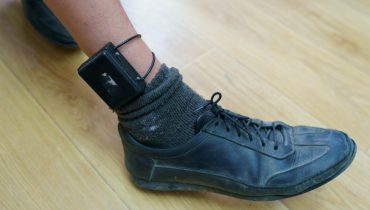 Electronic bracelet for criminals. Gadget for control and monitoring of the execution of punishment