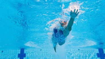 Female swimmer from beneath